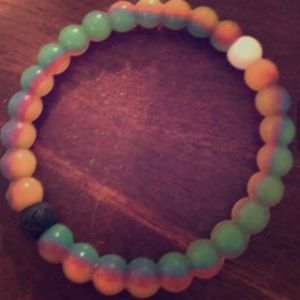 Brand new Rainbow Lokai size M